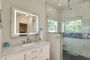 Shower, hair dryer, towels