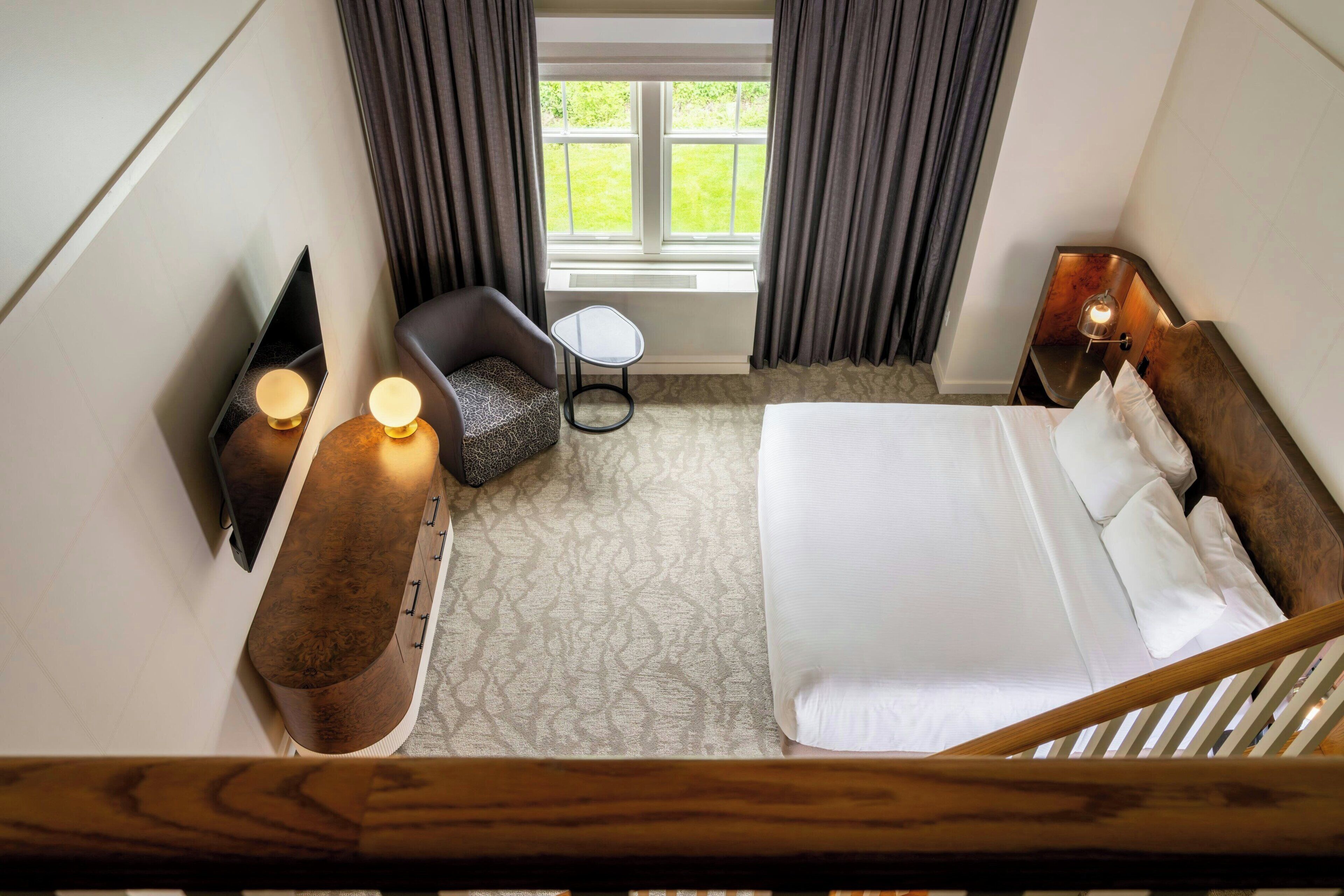 Premium bedding, desk, laptop workspace, free WiFi