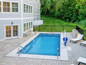 Seasonal outdoor pool, pool umbrellas, pool loungers