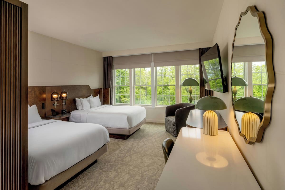 Premium bedding, desk, laptop workspace, free WiFi