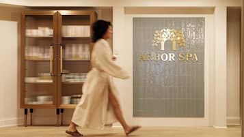 Experience the serenity of Arbor Spa, featuring a bathtub and tranquil atmosphere.