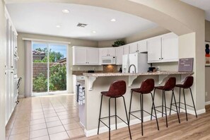 Fridge, microwave, oven, stovetop - Lakeside Retreat w/ Pool Access, Patio & Views (Indio)