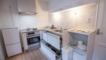 Fridge, microwave, stovetop, cookware/dishes/utensils