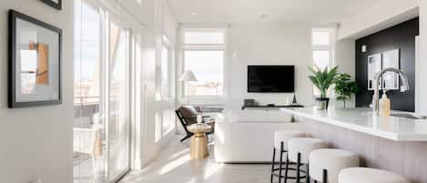 Condo, Multiple Beds, Patio, City View (Unit 404) | Living area | 40-inch TV with digital channels