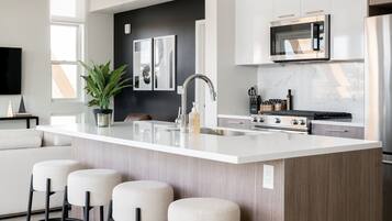 Appart'hÎtel, plusieurs lits, patio, vue ville (Unit 404) | Cuisine privée