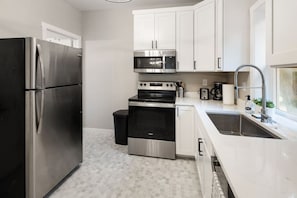 Fridge, microwave, oven, stovetop - Mid-Century Connection | Nestled Amid Universities (Sioux Falls)