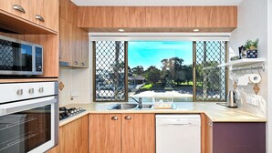 Coffee/tea maker, fridge, microwave, oven - Enjoy waterfront views and a short walk to the beach, restaurants and cafes. (Mooloolaba)