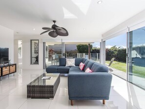 Luxury House, Garden View | Living area | 55-inch Smart TV with digital channels, Netflix, streaming services