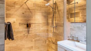 Shower, hair dryer, towels, soap