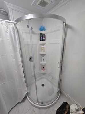 Shower, hair dryer, towels, soap