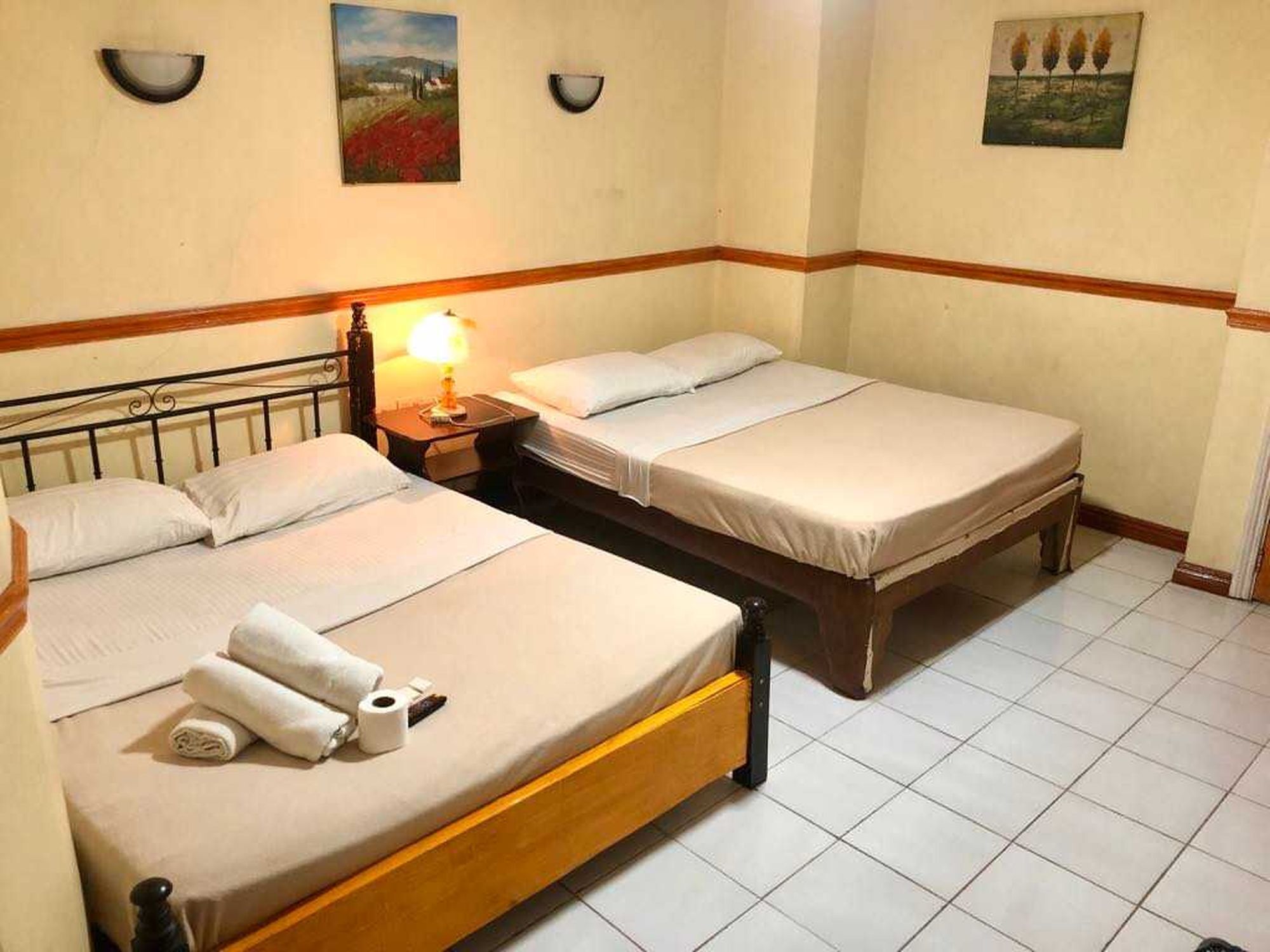 Deluxe Triple Room | Desk, laptop workspace, WiFi (free), bed sheets