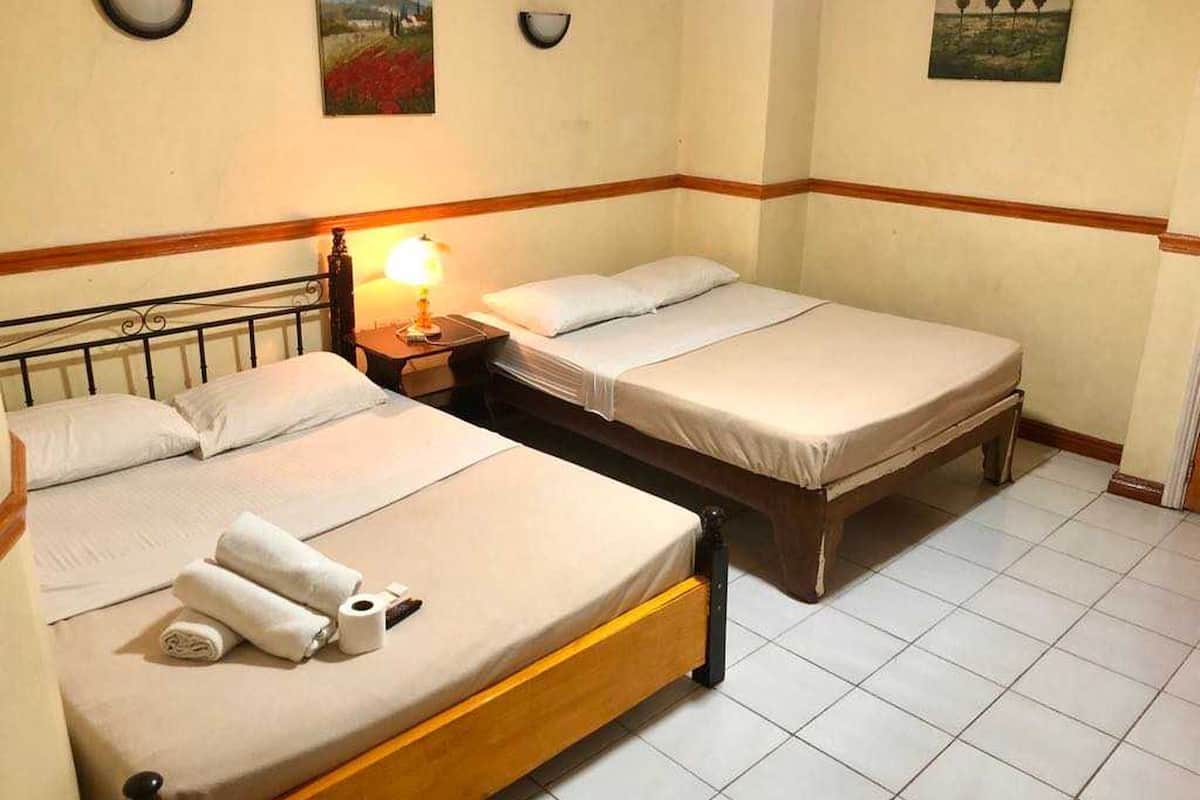Deluxe Triple Room | Desk, laptop workspace, WiFi (free), bed sheets