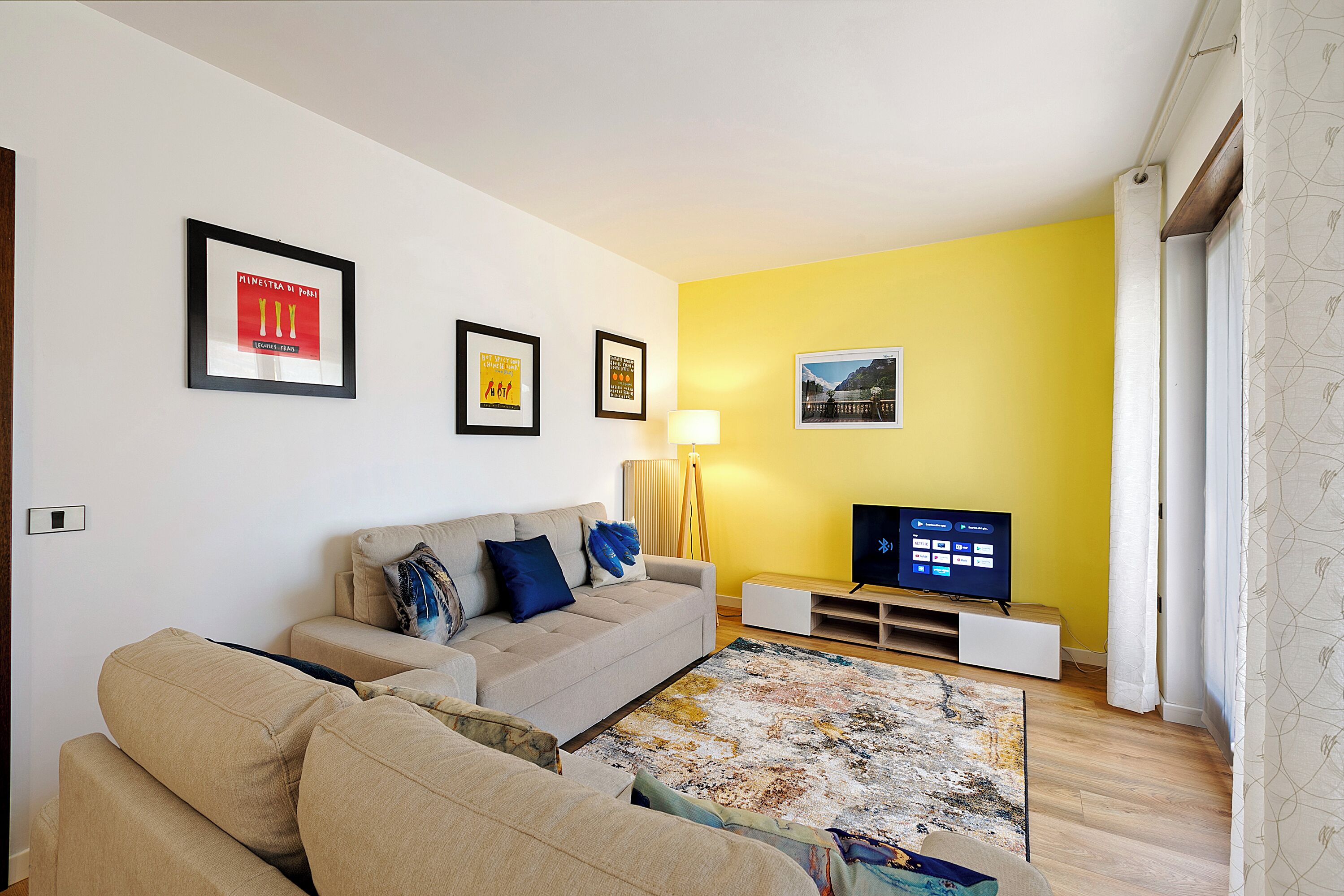 Family Apartment, Multiple Bedrooms (Il Giardino di Riva) | Living area | 21-inch flat-screen TV with cable channels, TV
