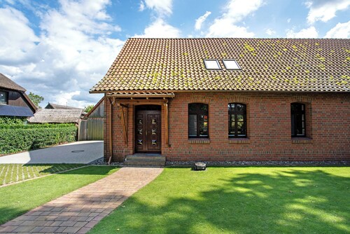 Ferienhaus 'Ferienhaus Dorfidyll' mit privater Terrasse, privatem Garten und WLAN