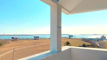 Habitación cuádruple familiar, balcón, vista al océano | Vista desde la habitación