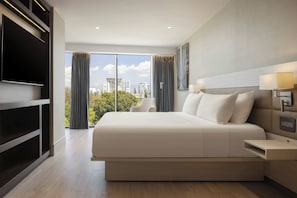 Suite, 1 King Bed with Sofa bed, Non Smoking, City View | Desk, laptop workspace, soundproofing, iron/ironing board