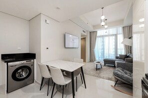 Premium Apartment, 2 Bedrooms, Balcony, City View | Living room | 50-inch Smart TV with digital channels - Extremely High 2BR in Aykon City Tower (Dubai)