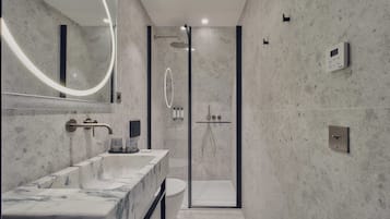 Deluxe One-Bedroom Apartment with City View 603 | Bathroom | Shower, hair dryer, slippers, towels