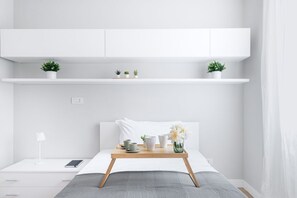 2 habitaciones, tabla de planchar con plancha, wifi y ropa de cama 