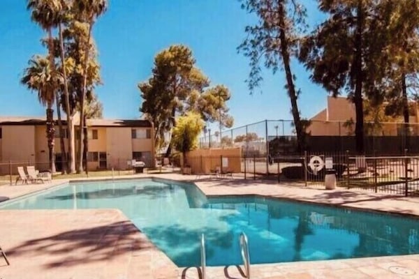 Immerse yourself in vacation bliss at our pool area.