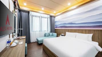 Quarto luxo | 1 quarto, frigobar, cofres nos quartos, cortinas blackout