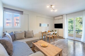 Deluxe Apartment, Sea View | Living area | Flat-screen TV - Seaview Portside apartment (Corfu)
