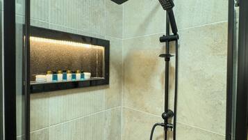 Shower, hair dryer, slippers, towels