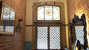 A room with a piano, a chandelier, and a stained glass window. - Eagle's Nest Boutique Hotel (Istanbul)