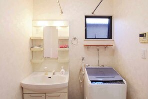 Hair dryer, towels, soap, shampoo