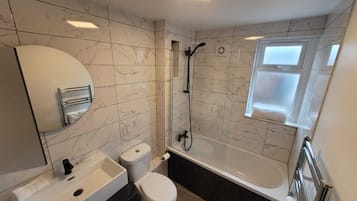 Hair dryer, towels, soap, shampoo