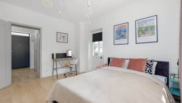 1 bedroom, desk, iron/ironing board, travel crib