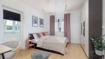 1 bedroom, desk, iron/ironing board, travel cot