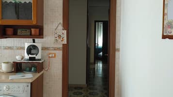 Full-size fridge, microwave, dishwasher, espresso maker