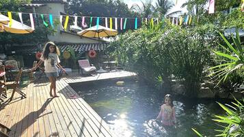 Outdoor pool, pool umbrellas, sun loungers