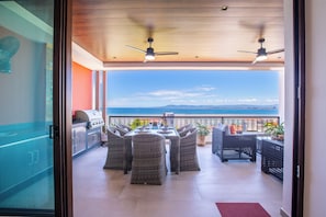 Outdoor dining - Rooftop Pool + BBQ Terrace | Luxury Ocean View 2BR (Puerto Vallarta)