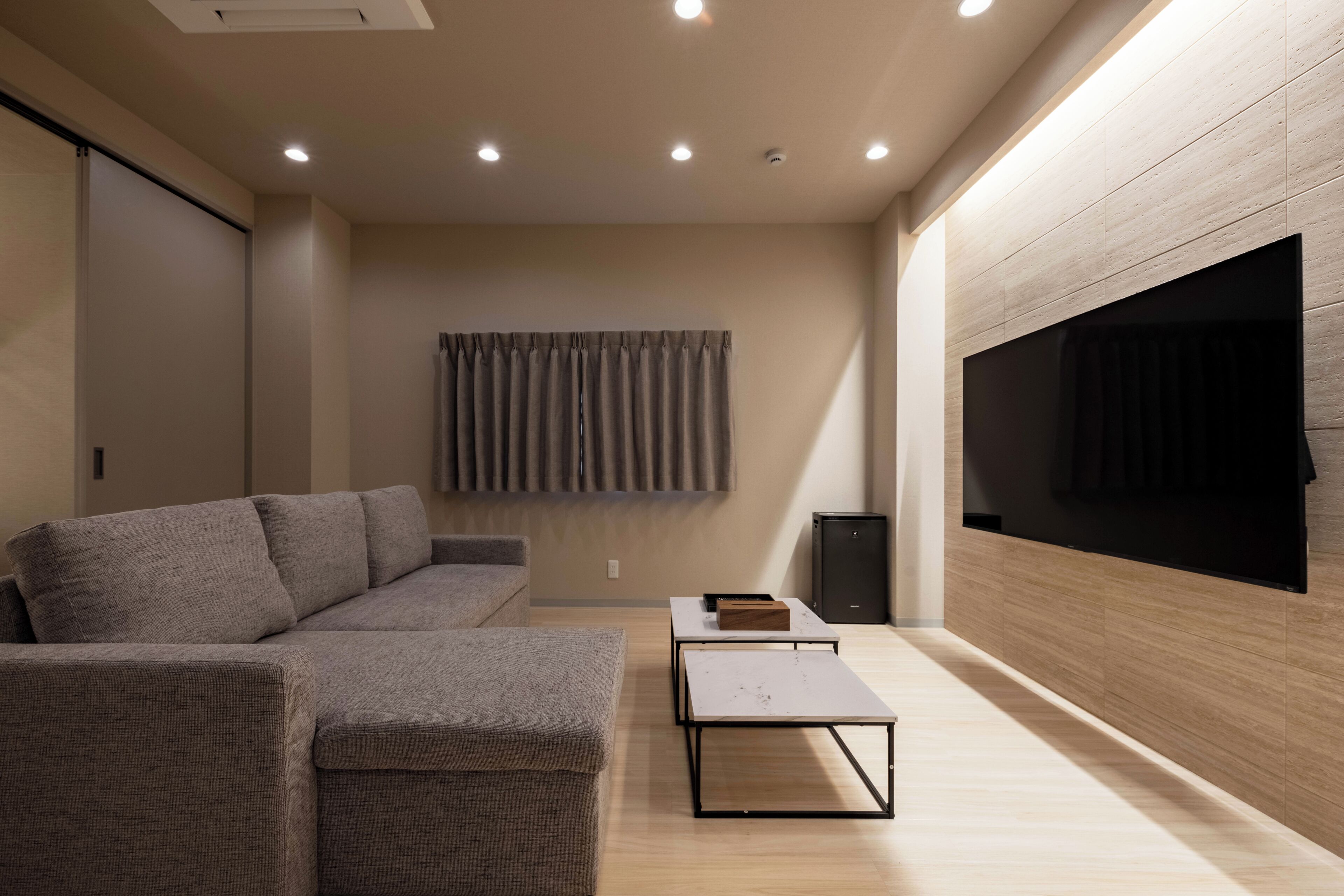 65-inch Smart TV with cable channels, fireplace