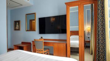 Premium bedding, down duvets, in-room safe, desk