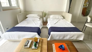 2 bedrooms, desk, iron/ironing board, travel crib