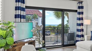 Condo, Multiple Beds, Balcony, Pool View (The Palms of Seagrove #B4) | Living area | 42-inch flat-screen TV with digital channels