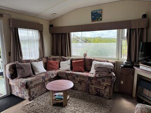 Cabin | Living area | TV - Family Friendly 3 Bedroom Caravan Pets go Free (King's Lynn)