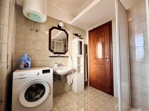 Hair dryer, towels, soap, toilet paper