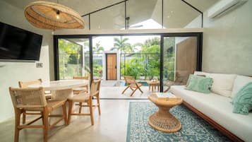 Classic Villa, Patio | Living room | Flat-screen TV
