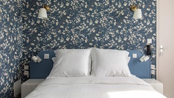Premium bedding, desk, blackout drapes, soundproofing