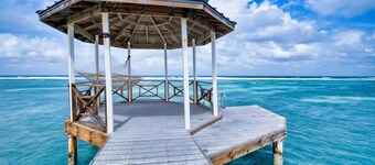 Far Tortuga: 20 Adults Single Level Beach Villa w/ Heated Pool and Private Dock