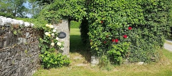 6 granite cottages in a courtyard set in 5 acres of gardens in rural Ireland