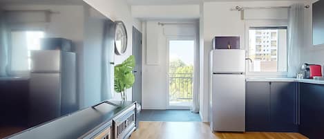 Fridge, microwave, stovetop, coffee/tea maker