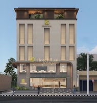 Un hotel moderno con un logotipo destacado, amplias ventanas y una entrada bien iluminada.