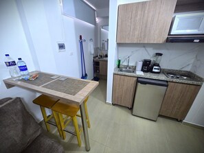 Fridge, microwave, coffee/tea maker, blender