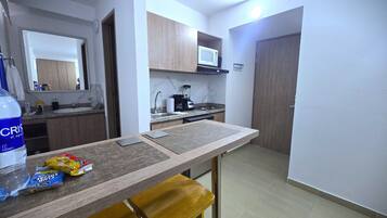 Fridge, microwave, coffee/tea maker, blender