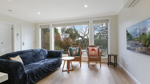 Living area - Enjoy picture frame views of Lake Sambell from the living room window! (Beechworth)